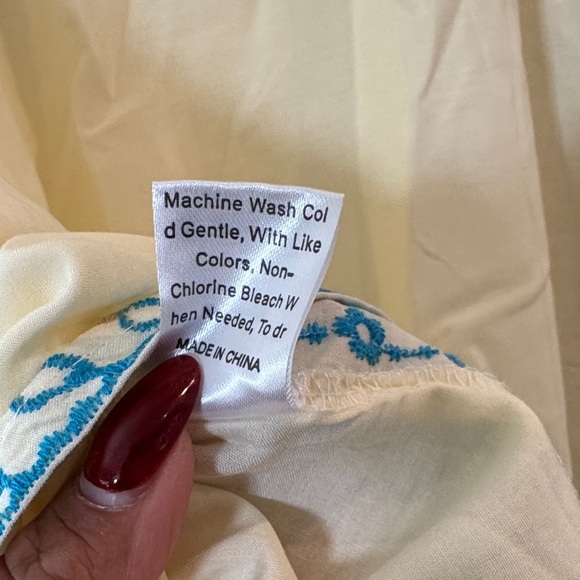 Embroidered Cream Blouse with Floral Accents - Picture 7 of 7